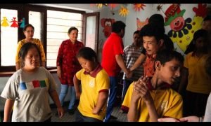 Through Social Work and Traditional Clothing in Nepal